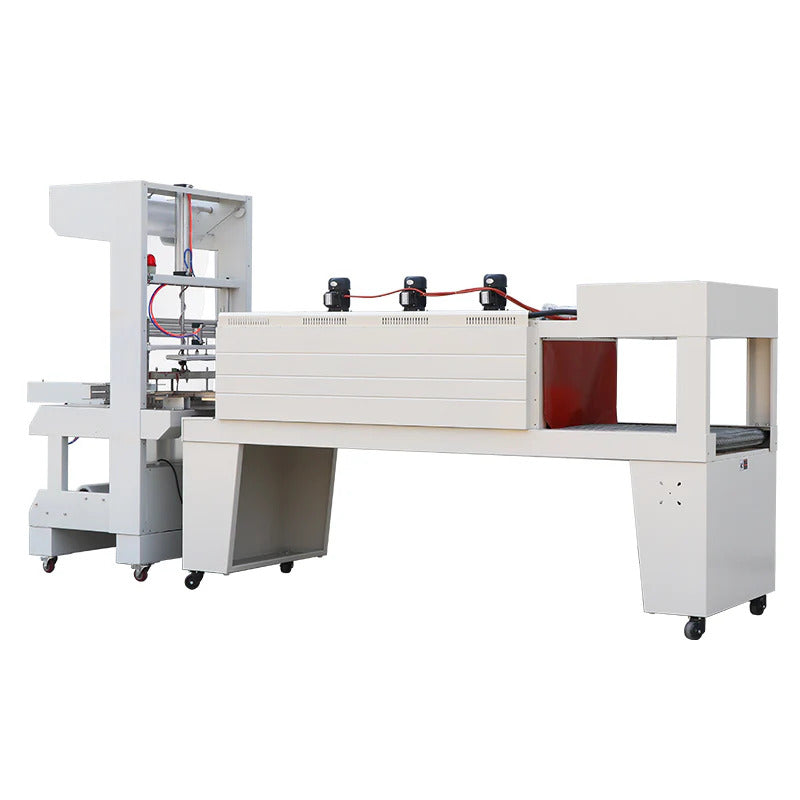 Integrated sleeve wrapping machine and shrink tunnel packaging system