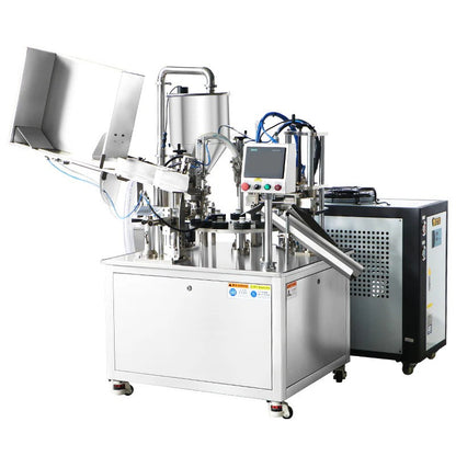 Automatic tube filling and sealing machine for creams and lotions