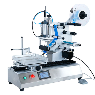 Desktop semi-automatic flat surface labeling machine with foot pedal control